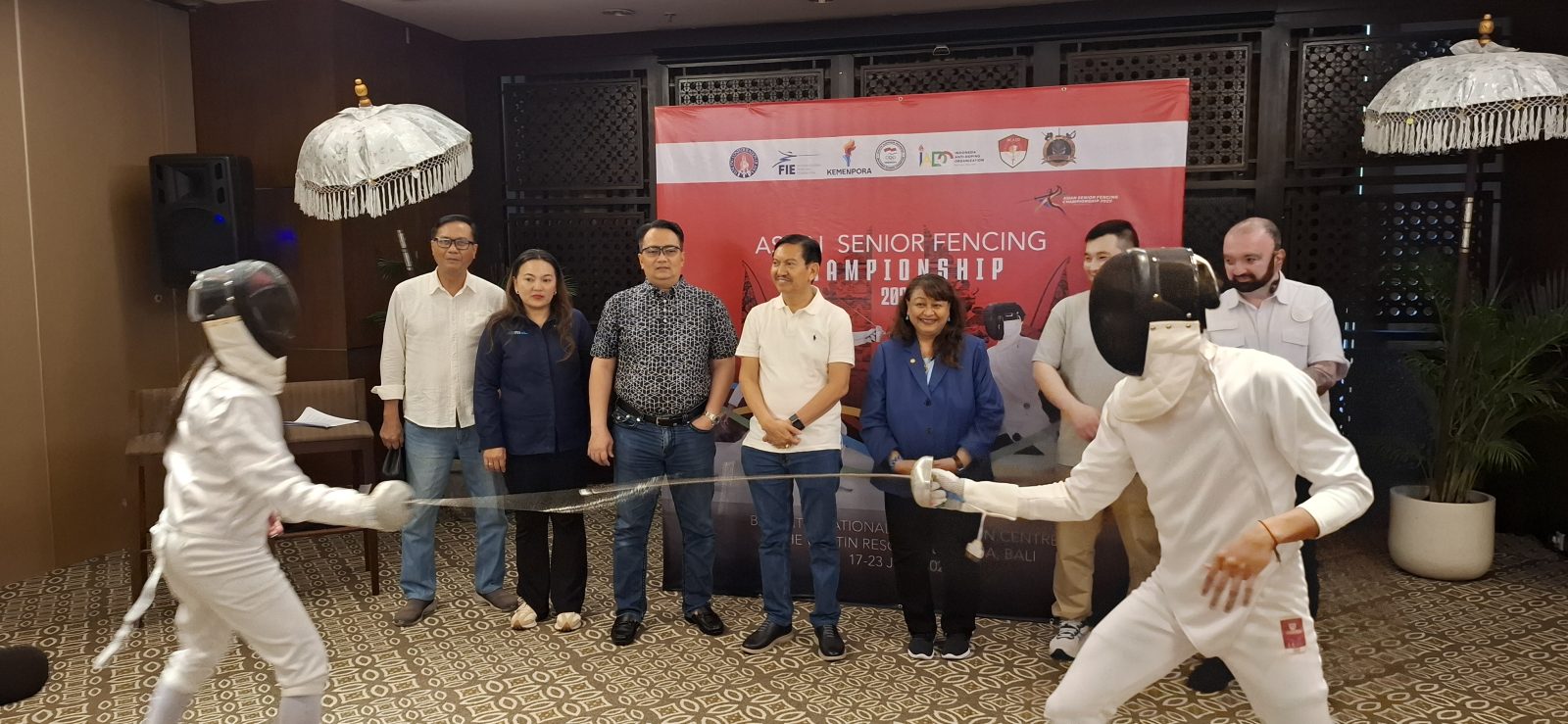 Photo/Ist Ready to Compete: Two Balinese fencers ready to represent Indonesia in the “Asian Senior Fencing Championship 2025” pose in front of the organizing committee.