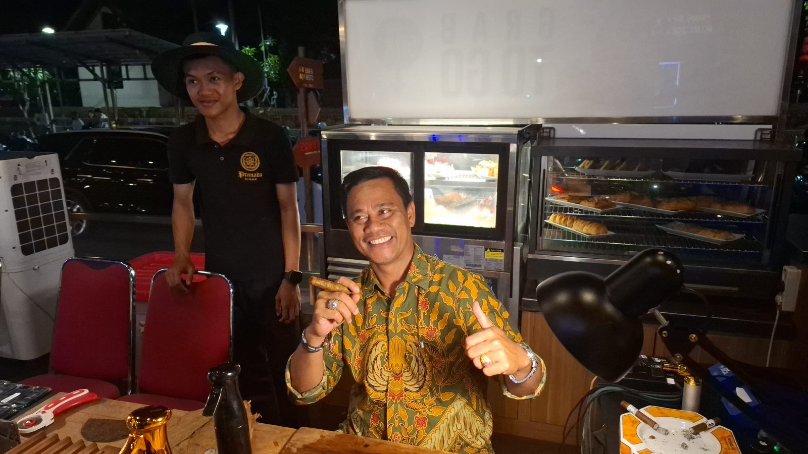 Istana Rama: Ketut Darmayasa, General Manager of Grand Istana Rama Hotel Kuta, taking part in the cigar workshop.